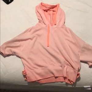 Pink cropped hoodie.